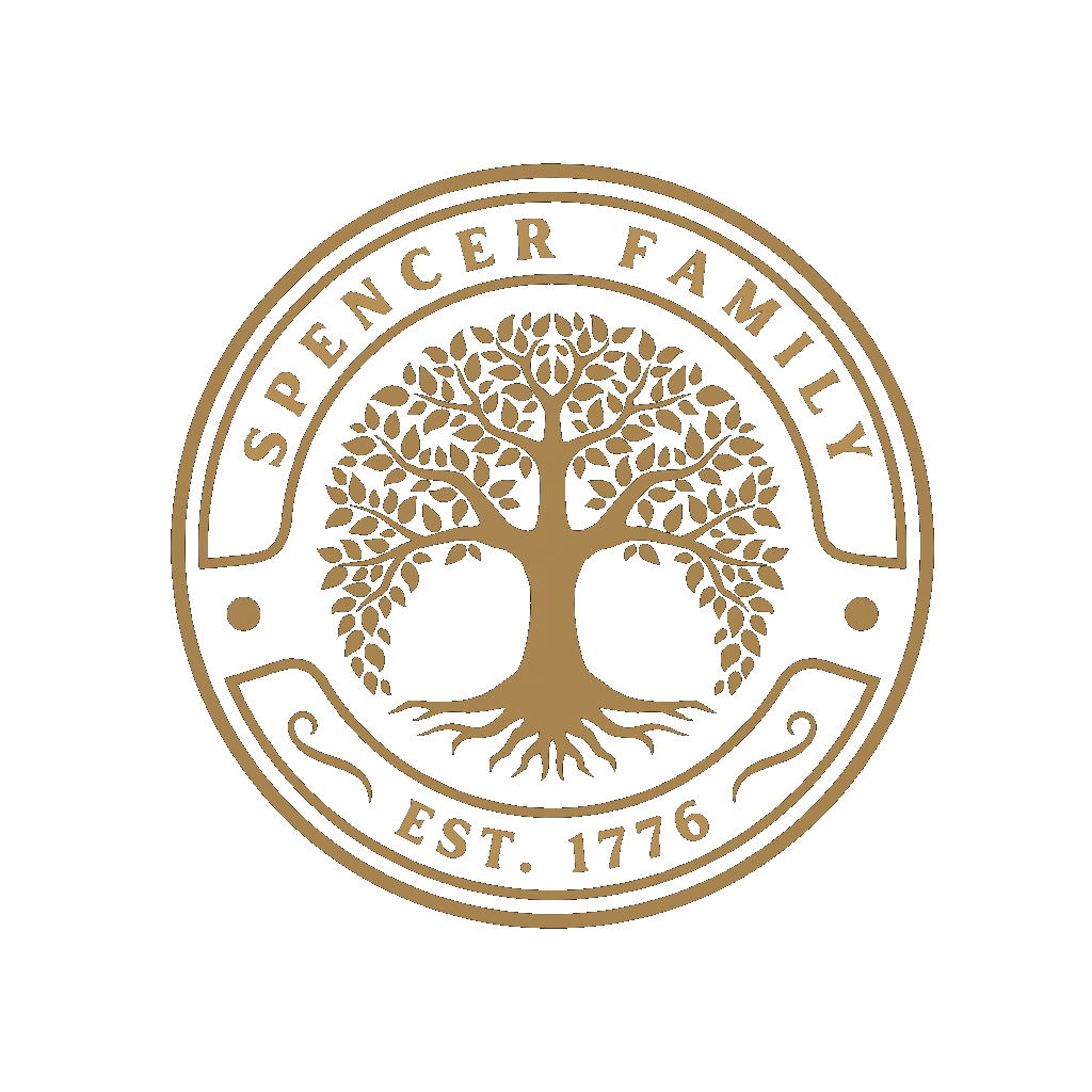 Spencer Family crest — a gold tree of life in a circular vintage seal