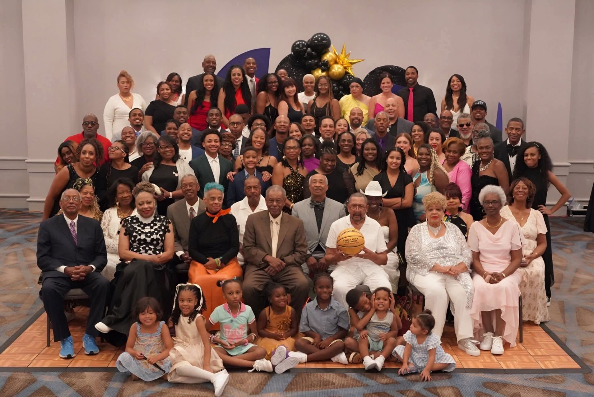 Large formal Spencer family group portrait at the reunion banquet